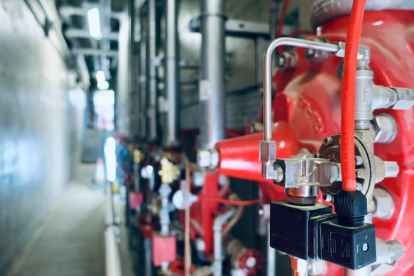 How to ensure compliance with fire safety regulations in high-rise buildings in Leeds?